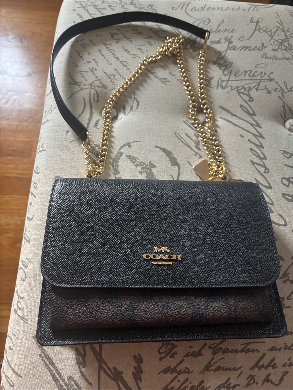 Coach Black Leather Crossbody with Gold Chain and Brown Interior Accent